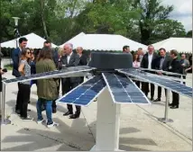  ??  ?? L’inaugurati­on a commencé par la visite de la « fleur solaire » en présence de Richard Galy, maire de Mougins, et de Sébastien Leroy, vice-président de Cannes Lérins. (Photos I. V.)