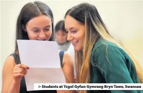  ??  ?? &gt; Students at Ysgol Gyfun Gymraeg Bryn Tawe, Swansea