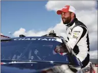  ?? James Gilbert / Getty Images ?? Ross Chastain enters his car during qualifying for the NASCAR Cup Series Goodyear 400 at Darlington Raceway on Saturday in Darlington, SC.