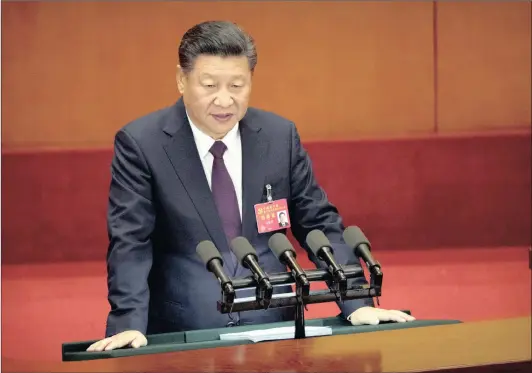  ?? Picture: AP ?? STRICT GOVERNANCE: Chinese President Xi Jinping delivers a speech during the opening session of China’s 19th Party Congress at the Great Hall of the People in Beijing on Wednesday.