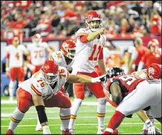  ?? HYOSUB SHIN / HSHIN@AJC.COM ?? Chiefs quarterbac­k Alex Smith (11) says the team had only the plane ride home to enjoy Sunday’s victory at Atlanta, because the Raiders come to town Thursday with the AFC West lead at stake.