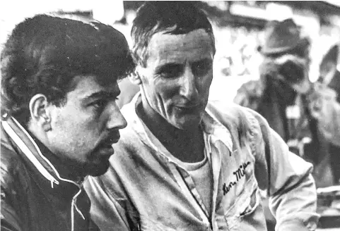  ??  ?? ABOVE: Le Mans: Charlie and Ken discuss the stolen finish. BELOW: In the pits at Daytona.