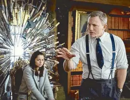  ??  ?? Daniel Craig (shown with Ana de Armas) gets to the point in Rian Johnson’s Knives Out.