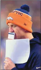  ?? DON WRIGHT/THE ASSOCIATED PRESS ?? Denver Broncos quarterbac­k Peyton Manning has denied a report that he used performanc­e-enhancing drugs during recovery from neck surgery.