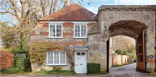  ?? Picture: STONEPHOTO.CO.UK ?? Charming: This delightful cottage is attached to Harnham Gate, leading to Salisbury Cathedral