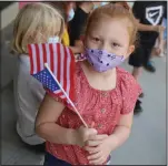  ?? Guy Mccarthy
/ Union Democrat ?? Chloe Sebold, a first-grader attenaya Elementary School, waits to meet U.S. Olympics and Army sharpshoot­er Sagen Maddalena on Friday during day one of the world-class athlete’s homecoming tour.