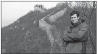  ?? AP ?? This undated file photo provided by Jennifer McLean shows her son, University of Montana student Guthrie McLean, on the Great Wall of China.