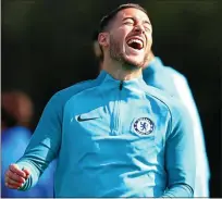  ??  ?? All smiles: Eden Hazard is fit again after breaking his ankle