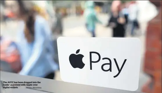  ?? Picture / Bloomberg ?? The ACCC has been dragged into the banks’ argument with Apple over digital wallets.