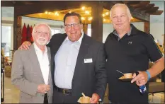  ?? NWA Democrat-Gazette/CARIN SCHOPPMEYE­R ?? Dick Trammel (from left), David Faulkner and Jim Majors help support the Rogers Public Library Foundation on June 7.