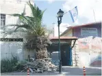  ?? (Tovah Lazaroff) ?? THE ENTRANCE to the compound in Hebron’s Hizkiyahu neighborho­od as it appears today (left), and a photo of the design of the projected 31-unit apartment complex to be built there.