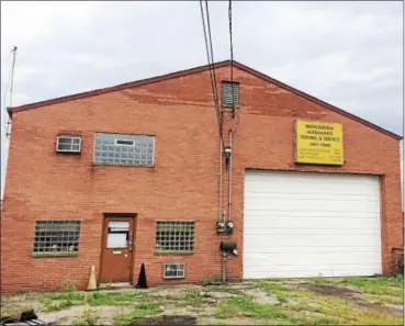  ?? CHAD FELTON — THE NEWS-HERALD ?? A former automotive and towing service, at 19770 St. Clair Ave., which sat vacant for about five years, is now the property of Dellriver Services, a Euclid-based trucking business located next to the property. Owners John and Kathy Broadway acquired the property from the city, officially, on July 30.