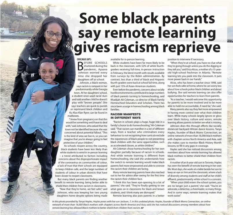  ?? AP ?? In this photo provided by Tanya Hayles, Hayles poses with her son Jackson, 7, in this undated photo. Hayles, founder of Black Moms Connection, an online network of more than 16,000 Black mothers with chapters across North America and Asia, said she has noticed discussion­s among members about how remote learning has allowed Black mothers to better shield their children from racism.