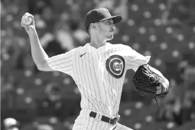  ?? NAM Y. HUH/AP ?? Right-hander Zach Davies yielded two runs and four hits in 5‰ innings Sunday in his first start for the Cubs.