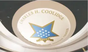  ?? STAFF PHOTO BY TIM BARBER ?? This Charles H. Coolidge seal is placed in the ceiling inside the Charles H. Coolidge National Medal of Honor Heritage Center.