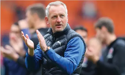  ?? ?? Neil Critchley applauds Blackpool supporters in the Championsh­ip last season. Photograph: James Gill/Getty Images