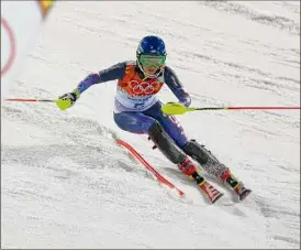  ?? Doug Pensinger / Getty Images ?? Mikaela Shiffrin of the United States is the defending Olympic champion in the giant slalom, which gets underway on Monday.