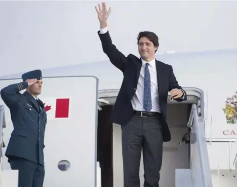  ?? ANDREW VAUGHAN/THE CANADIAN PRESS ?? Prime Minister Justin Trudeau departs Zurich on Saturday, after a busy week at the World Economic Forum in Davos.