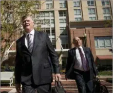  ?? ANDREW HARNIK — ASSOCIATED PRESS ?? Members of the defense team for Paul Manafort — Kevin Downing, left, and Thomas Zehnle — arrive at federal court in Alexandria, Va., on Friday for a hearing in the criminal case against former Trump campaign chairman.