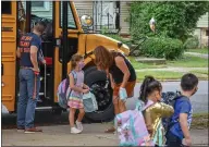  ?? CARLY STONE - MEDIANEWS GROUP ?? Students exiting the bus on their first day of the 2021school year. North Broad Elementary. September 7.