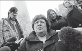  ?? JEAN LEVAC/ POSTMEDIA NEWS ?? Attawapisk­at Chief Theresa Spence, at the centre of the Attawapisk­at housing crisis last year, announced the beginning of a hunger strike on Parliament HIll on Monday.