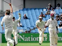  ??  ?? Batting superstar Brian Lara is dismissed by Shane Bond during an earlier West Indies tour.