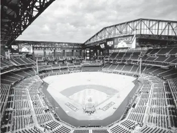  ?? K.C. ALFRED U-T ?? The Padres and Dodgers are averaging 8.5 total runs in the first two games of the NLDS with the roof open, at Globe Life Field, down from 11.8 runs per game with the roof open during the 2020 regular season.