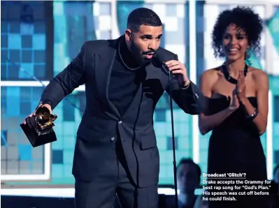  ??  ?? Broadcast ‘Glitch’?Drake accepts the Grammy for best rap song for “God’s Plan.” His speech was cut off before he could finish.