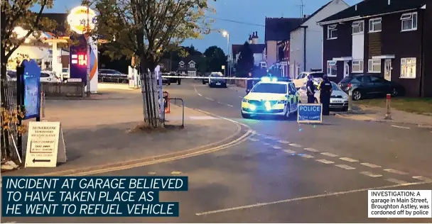  ??  ?? INVESTIGAT­ION: A garage in Main Street, Broughton Astley, was cordoned off by police