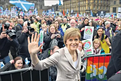  ?? GETTY IMAGES ?? Nicola Sturgeon is greeted by supporters and anti-nuclear activists at the annual CND Scotland Scrap Trident rally in Glasgow yesterday