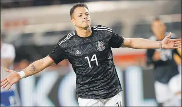  ?? Thearon W. Henderson Getty Images ?? JAVIER HERNÁNDEZ celebrates after his goal for Mexico last March, in one of only three games he played for the national team in 2019. Hernández wouldn’t say whether he wanted to play in the 2022 World Cup.