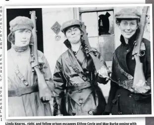  ??  ?? Linda Kearns, right, and fellow prison escapees Eithne Coyle and Mae Burke posing with rifles at an IRA training camp at Duckett’s Grove, Co. Carlow, in October 1921.