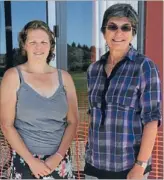  ?? Photo: SARAH DUNN/
FAIRFAX NZ ?? Show goes on: Sarau Festival volunteer Clare Jones, left, with organiser Jenny Leith outside the community centre which was damaged in a fire this week.