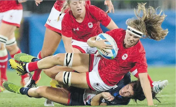  ?? SEAN KILPATRICK/THE CANADIAN PRESS/FILES ?? Canada’s Karen Paquin, seen playing against Britain in rugby sevens at the 2016 Olympic Games in Rio de Janeiro, says she left a “very organized and very supported” sevens group to try to win a Women’s Rugby World Cup with the national 15s team. The...