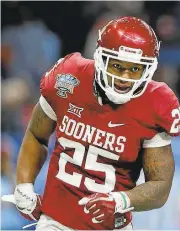  ?? GERALD HERBERT/ASSOCIATED PRESS ARCHIVES ?? Oklahoma running back Joe Mixon, taken by the Bengals, finished with two strong seasons for the Sooners. .