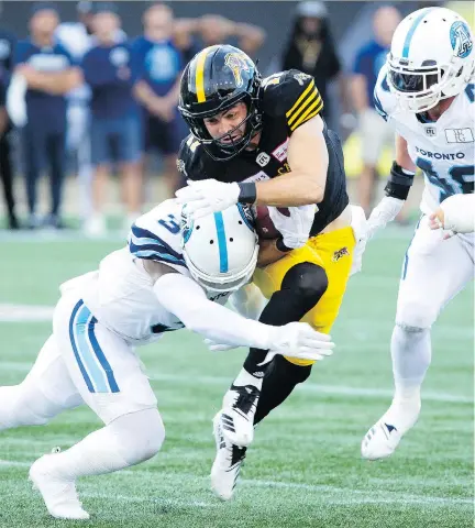  ?? PETER POWER/THE CANADIAN PRESS ?? “I think we can win a lot more games if we continue to fix the little things,” says Tiger-Cats receiver Luke Tasker.