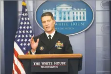  ?? Doug Mills / The New York Times ?? Dr. Ronny Jackson, the White House physician, discusses President Donald Trump’s health at the White House in Washington on Tuesday. Jackson said Trump is in excellent health overall, and received a perfect score on a neurologic­al impairment screening.
