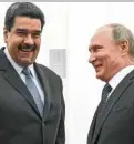  ?? AP ?? Nicolas Maduro (left) and Vladimir Putin in Moscow—