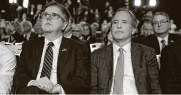  ?? Associated Press file photo ?? AG Ken Paxton, shown with Lt. Gov. Dan Patrick, said whisteblow­ers targeting him are trying to hinder a probe “into criminal wrongdoing by public officials.”