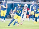  ?? KYUSUNG GONG/AP ?? Rams receiver Cooper Kupp runs past Cardinals cornerback Byron Murphy during Monday’s wild-card playoff game in Inglewood, Calif.