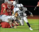  ?? PETE BANNAN-DIGITAL FIRST MEDIA ?? Pottstown quarterbac­k Josiah Wiggins breaks free in the second quarter against West Chester East.