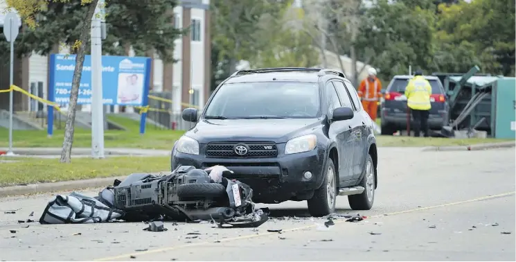  ?? LARRY WONG ?? The 58 year-old female driver of a Suzuki Burgman scooter was killed in a collision with a GMC SUV on Millwoods Road at 38 Ave. Friday morning.