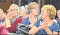  ?? NIKKI SULLIVAN/CAPE BRETON POST ?? People clap during a health-care rally in New Waterford on Sunday.