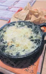  ??  ?? Spinach artichoke dip.