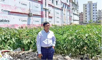  ?? ?? Journalist Najmul Huda, who shot footage of cracks in the Rana Plaza structure that presaged its collapse, standing at the site where the building once stood in Savar.