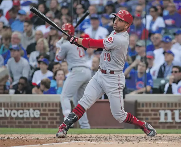  ?? JONATHAN DANIEL/GETTY IMAGES/FILES ?? Joey Votto’s numbers this season with the Cincinnati Reds are remarkable, leading the National League in on-base percentage, OPS and walks.