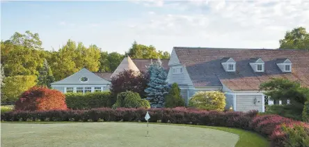  ?? The Mayflower Inn & Spa ?? The quietly elegant Mayflower Inn & Spa in Washington, Conn. features a putting green, above, as well as beautiful gardens and statuary. The Hotel Zero Degrees in Danbury ( photo left) — owned by RMS Companies, which also owns Hotel Zero Degrees in Norwalk, The Lloyd in Stamford, and The Blake in New Haven — is ideally located for overnight stays. Here, a fire pit and cozy chairs outside the hotel are ideal for a chilly summer night.