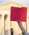  ?? ALEX BRANDON AP ?? Demonstrat­ors protest outside of the U.S. Supreme Court on Wednesday. A draft opinion could be poised to overturn the landmark 1973 Roe v. Wade case.