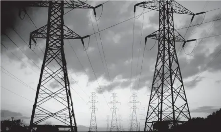  ?? Allison V. Smith / The New York Times ?? The top three retail power companies — NRG, Vistra Energy and Direct Energy, a unit of the British company Centrica — control at least two-thirds of the state’s deregulate­d power market. With NRG’s latest buy, that concentrat­ion is likely closer to 70 percent.