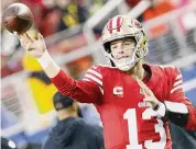  ?? Santiago Mejia/San Francisco Chronicle ?? San Francisco 49ers quarterbac­k Brock Purdy warms up ahead of an NFC Divisional Round playoff game against the Packers on Saturday.